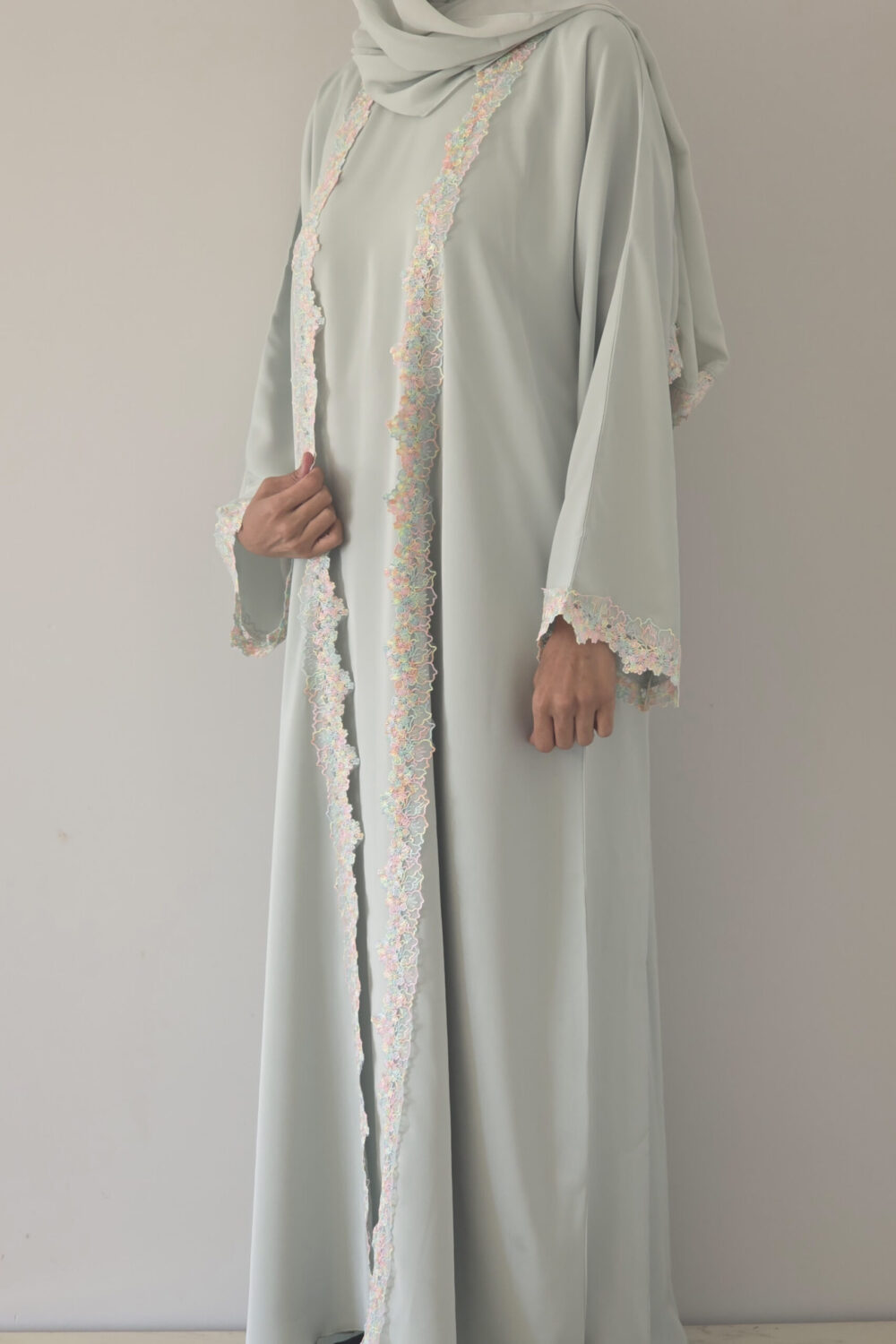 Mint Lace Abaya — mint green abaya with delicate lace trim, front view