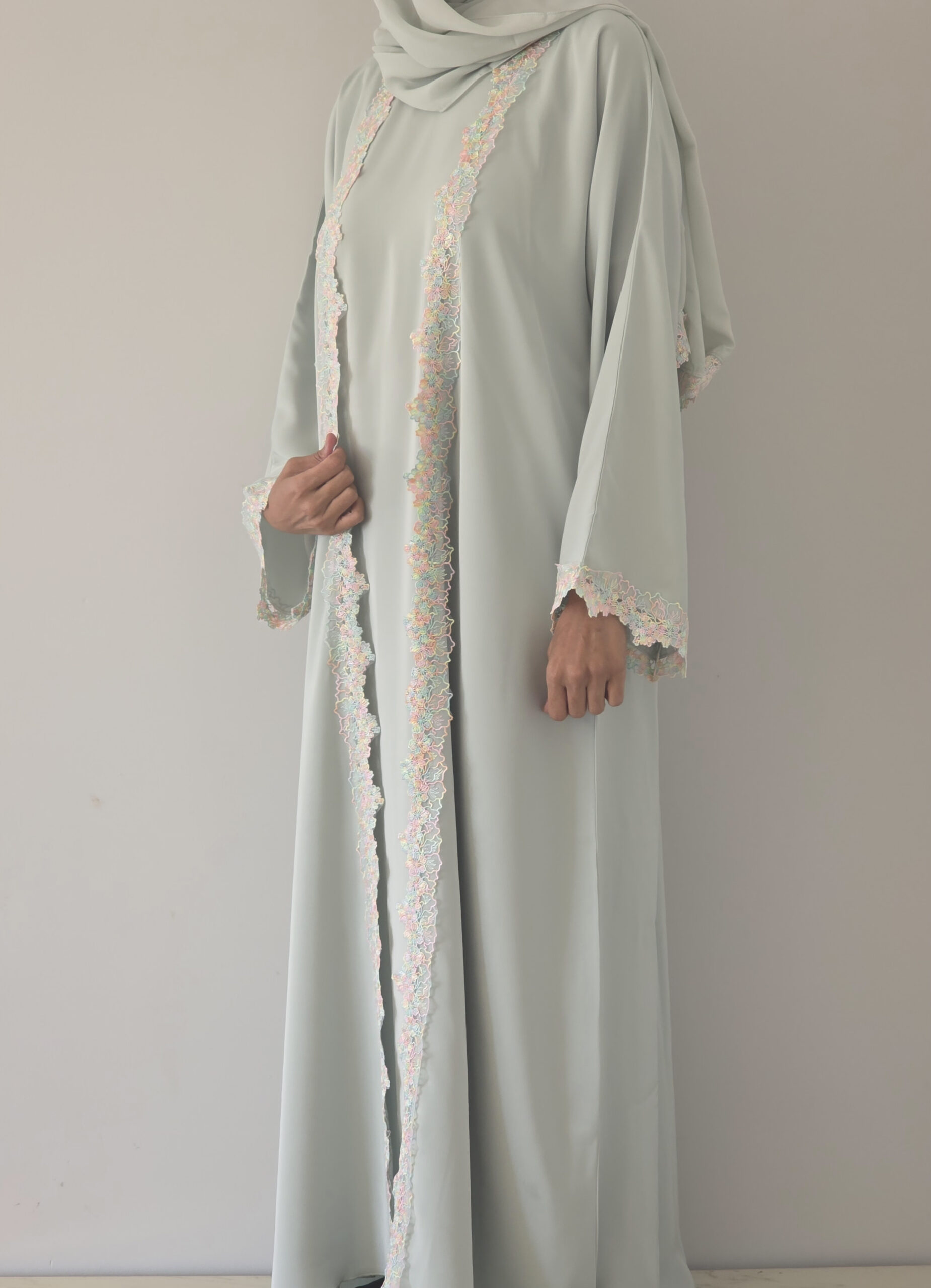 Mint Lace Abaya — mint green abaya with delicate lace trim, front view