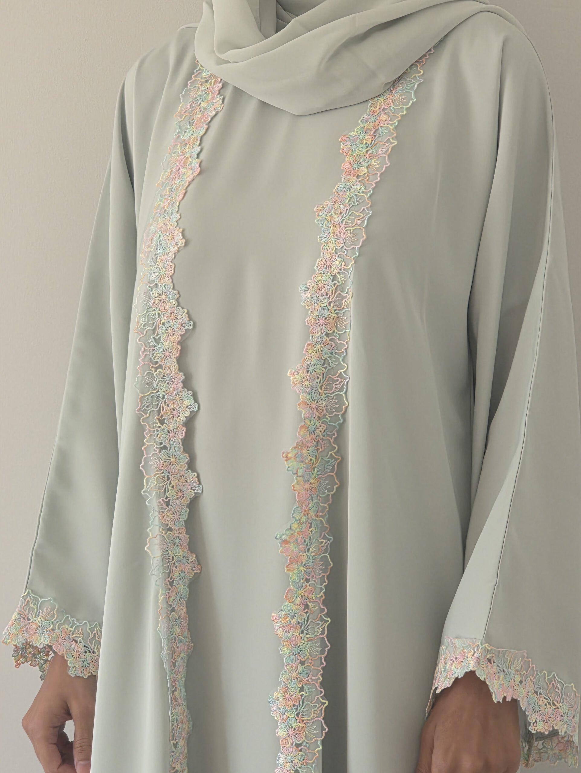 Mint Lace Abaya — mint green abaya with lace trim, side view