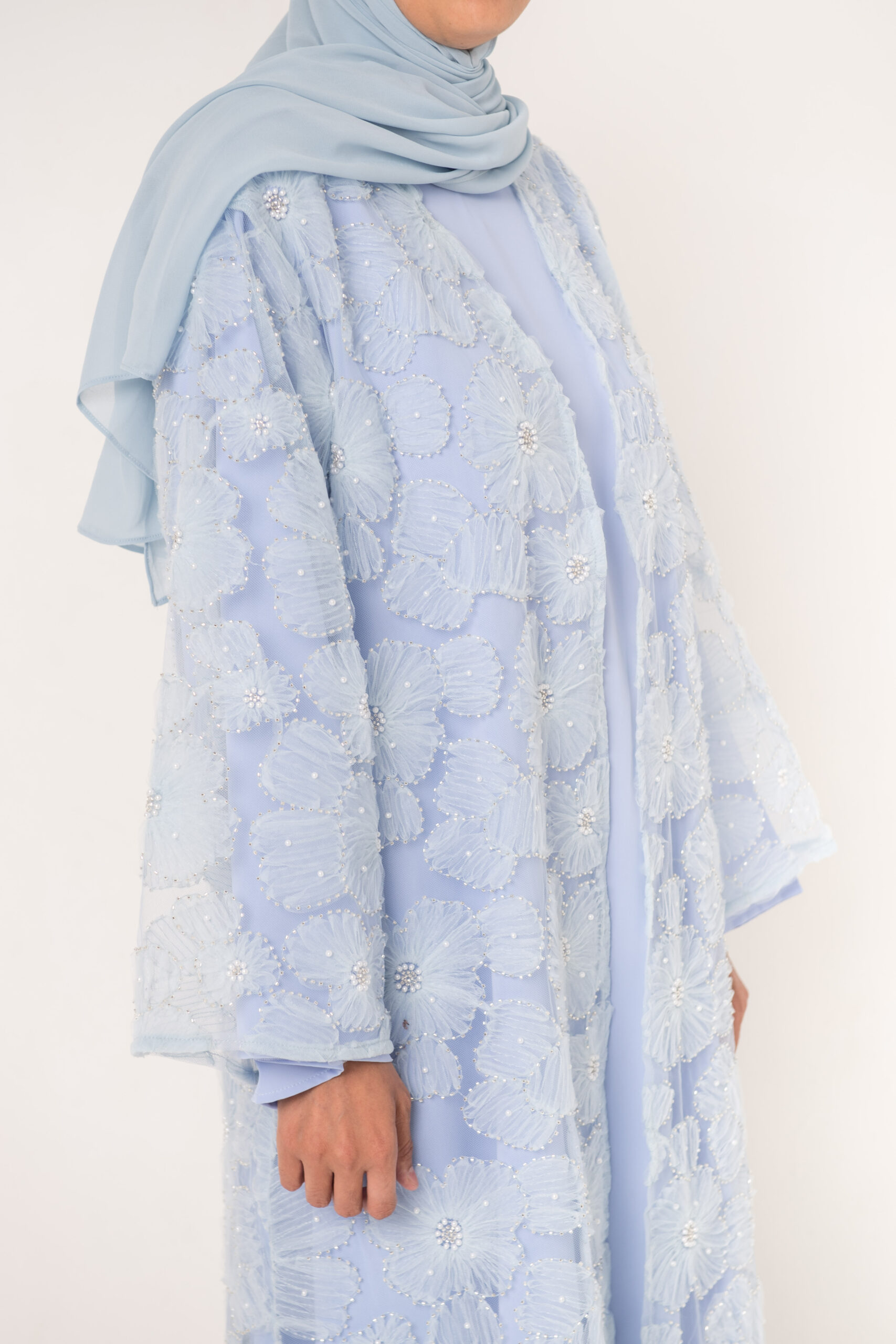 Event Elegance by Noora — floral embroidered occasion abaya, styled view