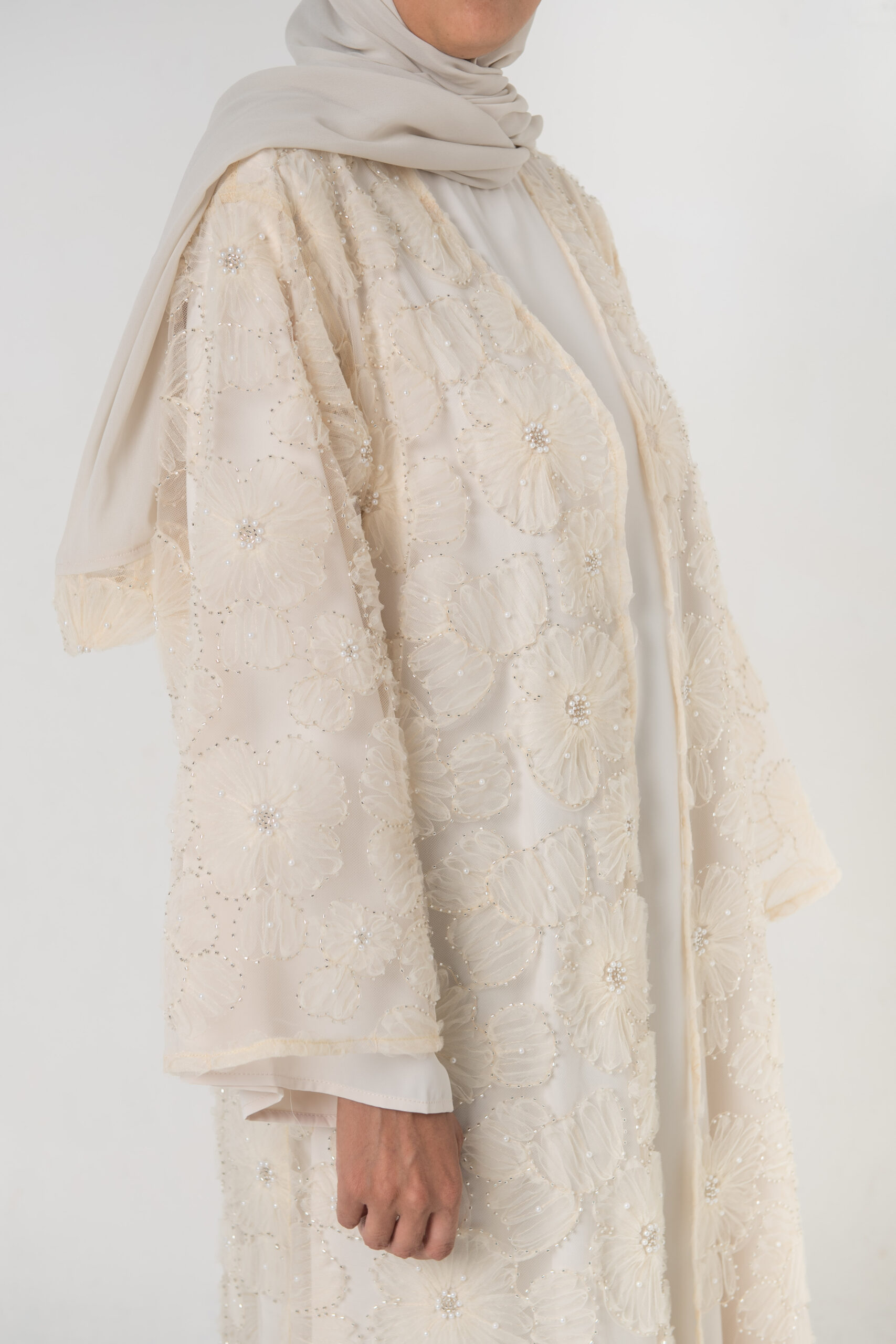 Lumens-1004 Event Elegance by Noora — floral embroidered occasion abaya, close-up detail