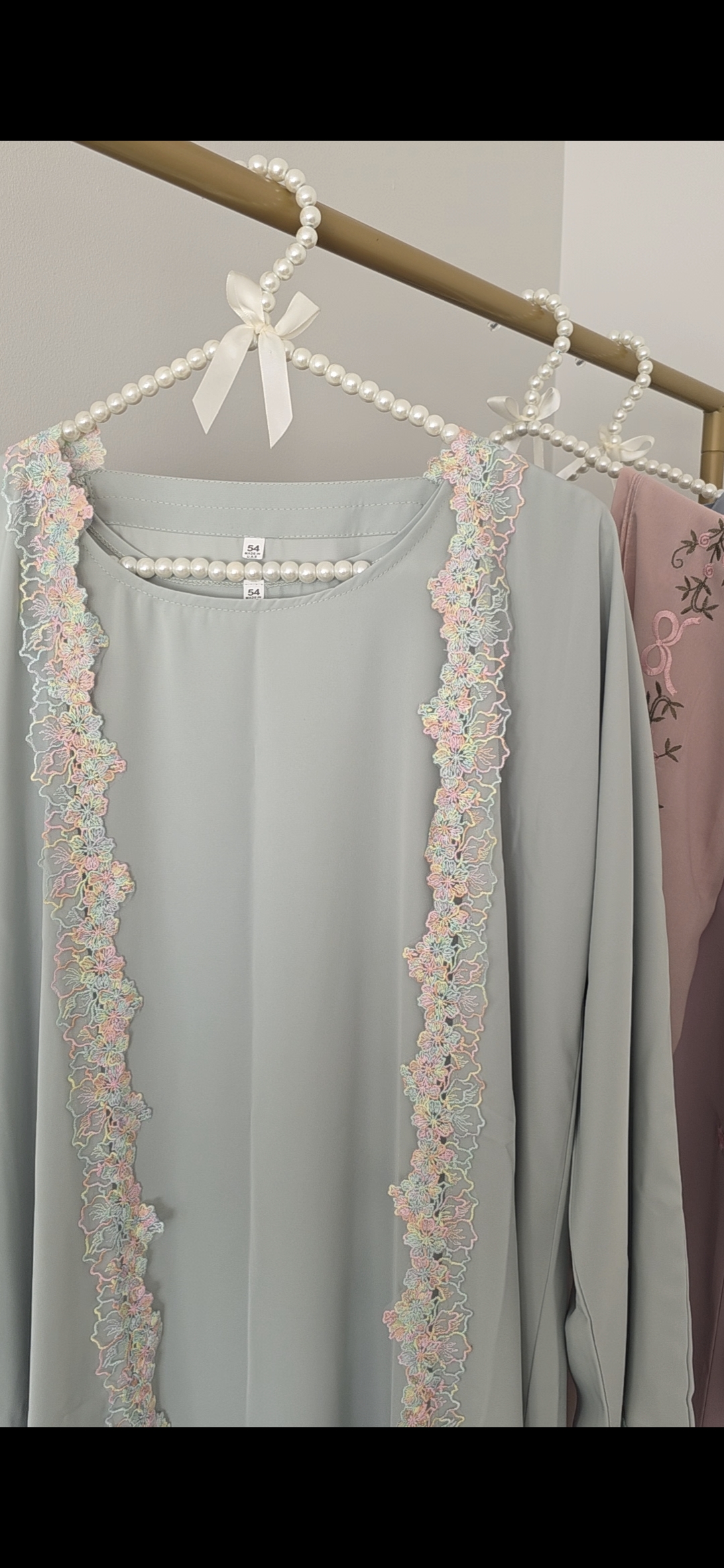 Mint Lace Abaya — mint green abaya with lace trim, close-up detail